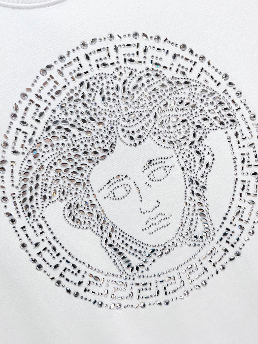 White Versace T-shirt front with rhinestone Medusa-style face graphic