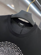 Black Versace T-shirt neckline with small brand tag inside collar
