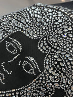 Black Versace T-shirt close-up of silver rhinestone Medusa graphic