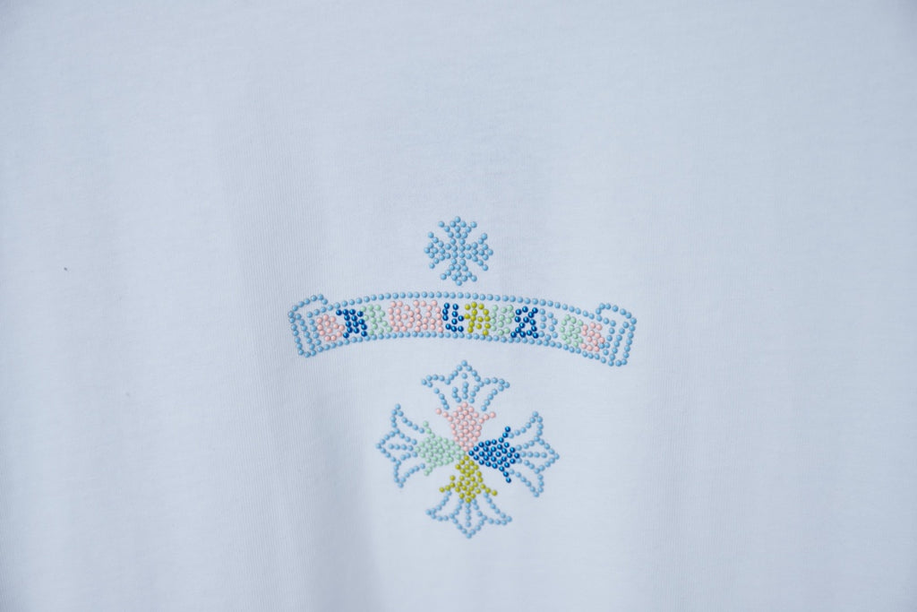 White T-shirt chest graphic with colorful beaded floral motif