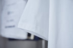 White T-shirt fabric and side hem detail on display