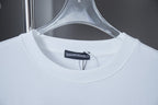 White T-shirt neckline with ribbed collar and brand tag
