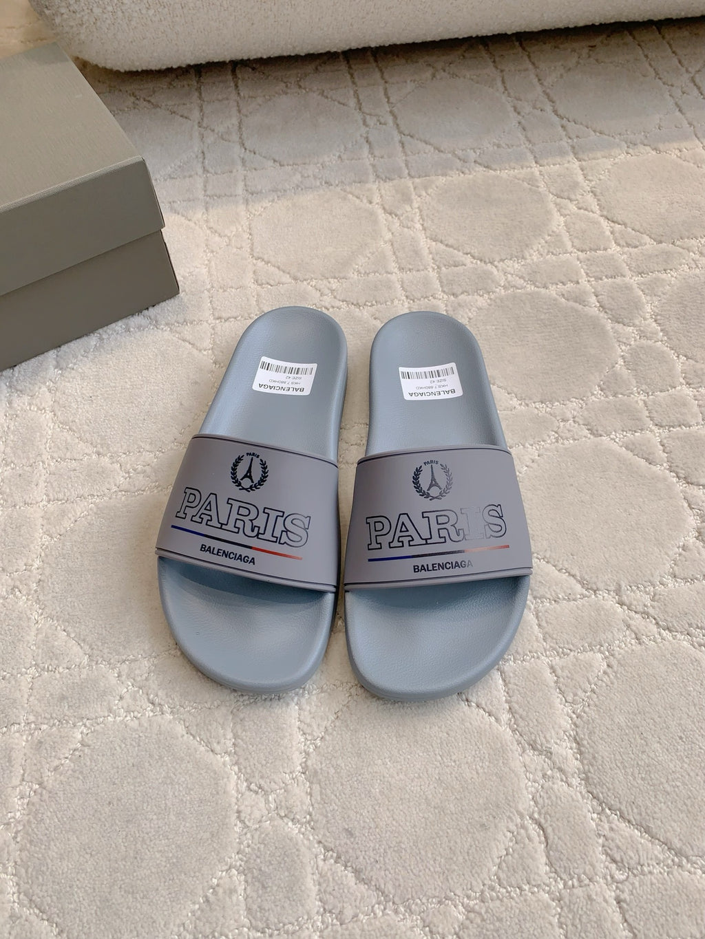 Balenciaga light blue slide sandals with PARIS strap and logo detailing