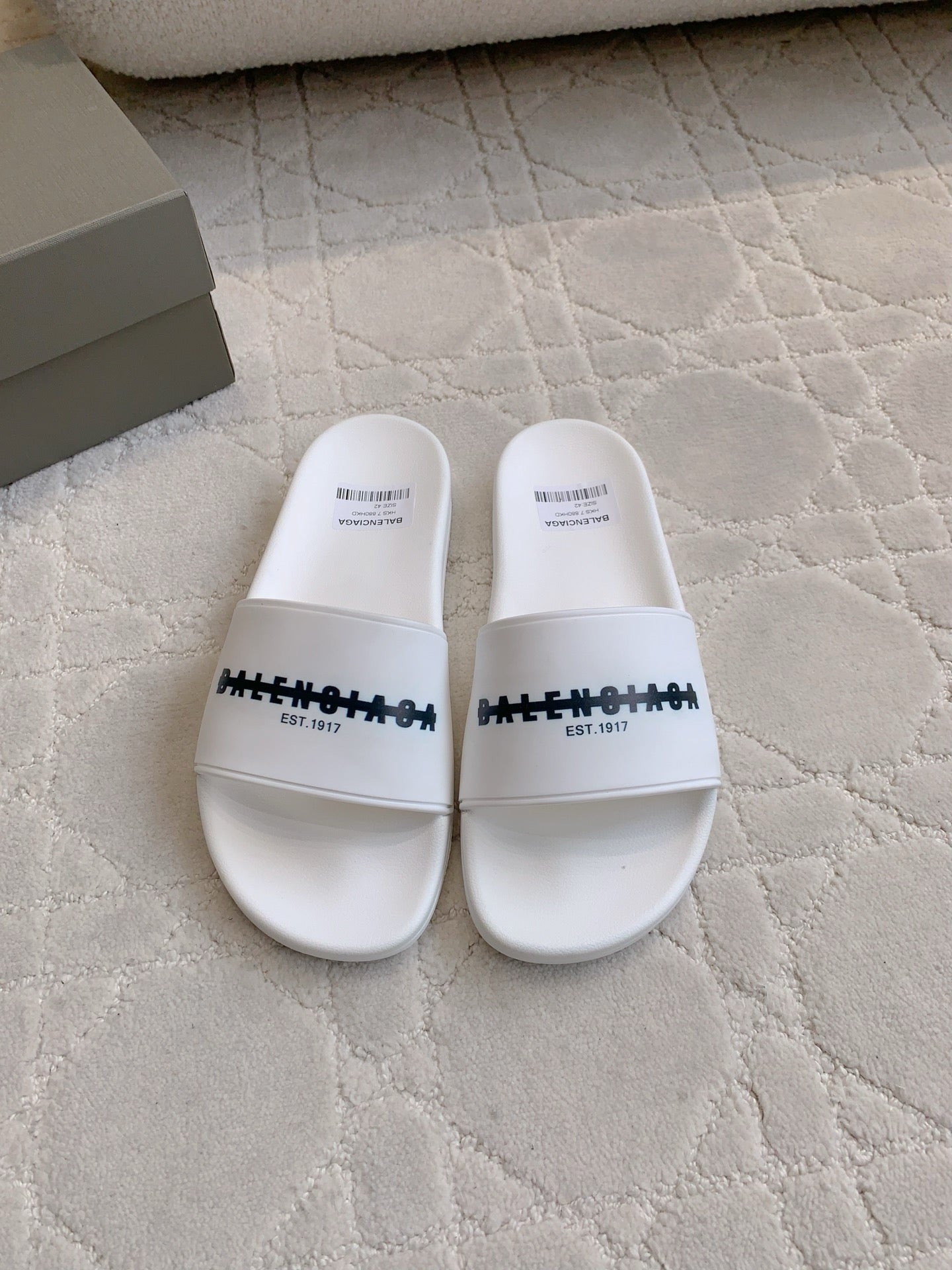 Balenciaga white slide sandals with black logo strap