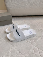 Balenciaga white slide sandals, single strap with black logo detail