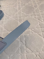 Balenciaga slide sandal strap, light blue rubber sole edge visible