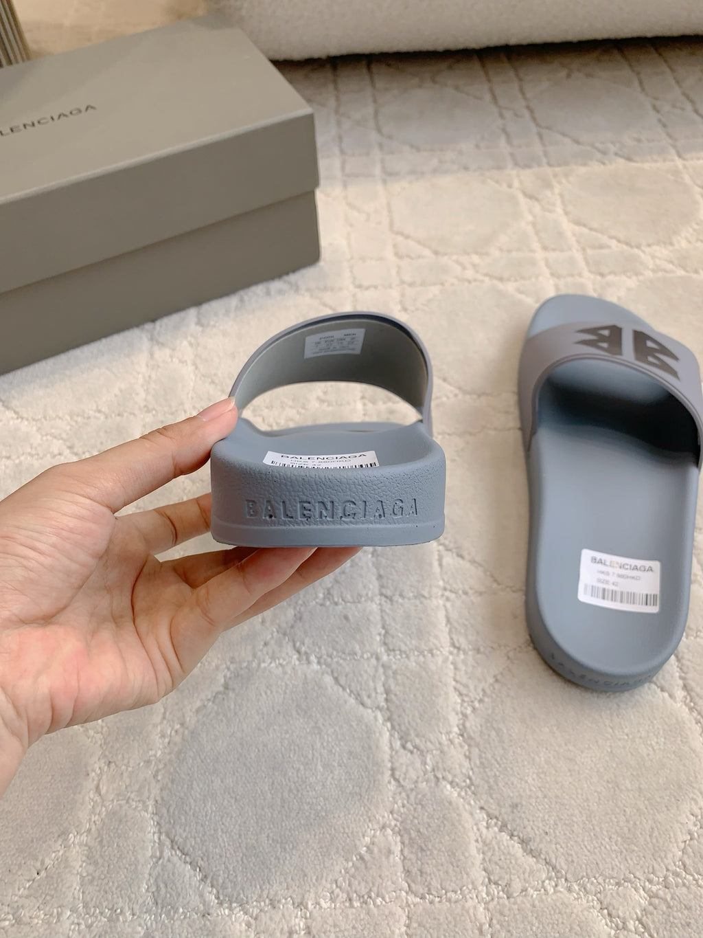 Balenciaga slide sandals, light blue heels with embossed logo on footbeds