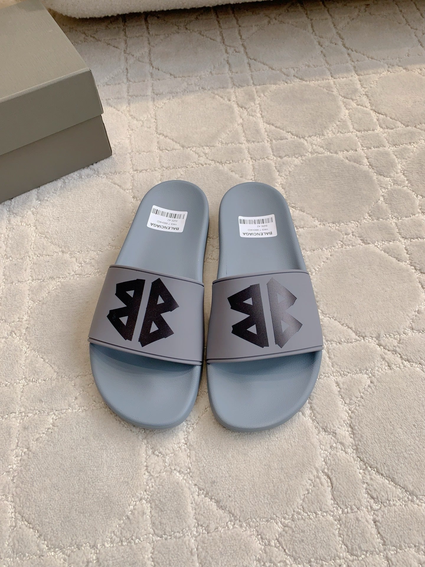 Balenciaga slide sandals, light blue with black logo on wide front strap