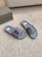 Balenciaga slide sandals, light blue with black logo patch on front strap