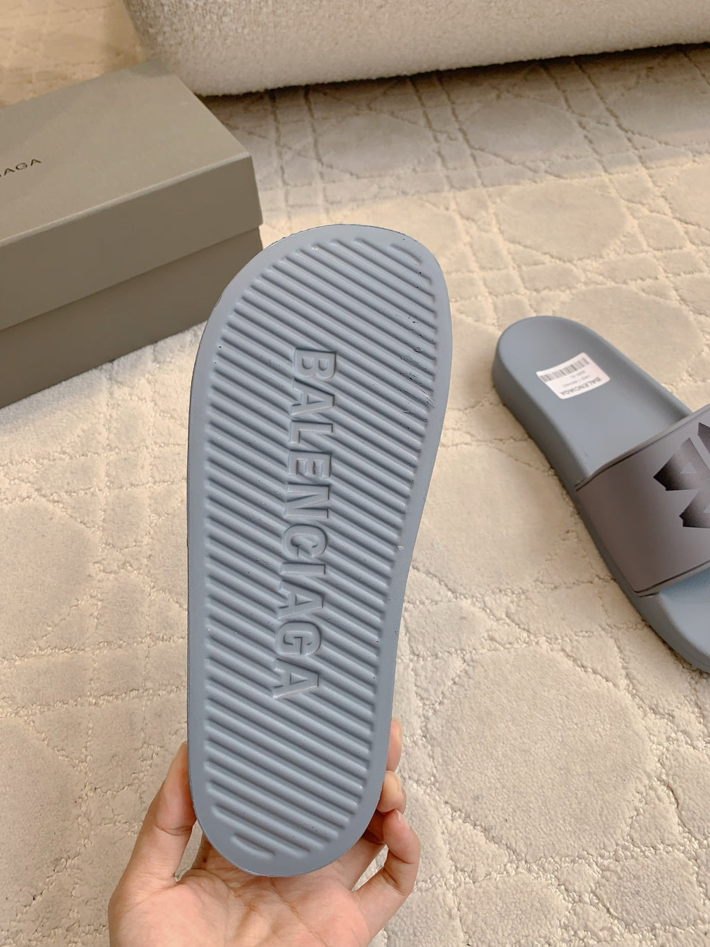 Balenciaga slide sandal outsole, light blue with embossed logo text