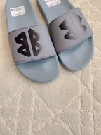 Balenciaga slide sandals, light blue with black logo on front cross strap