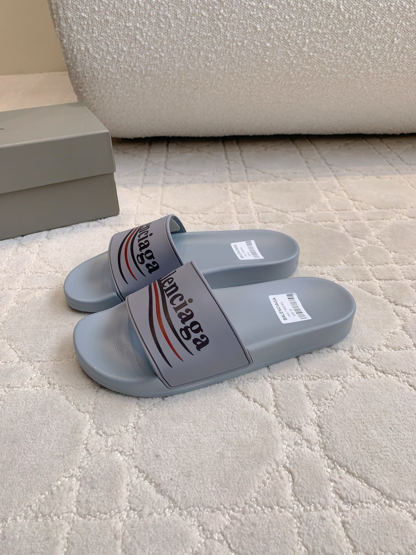 Balenciaga slide sandals, light blue-gray rubber with logo strap
