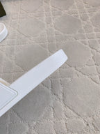 White slide sandal footbed with textured strap edge