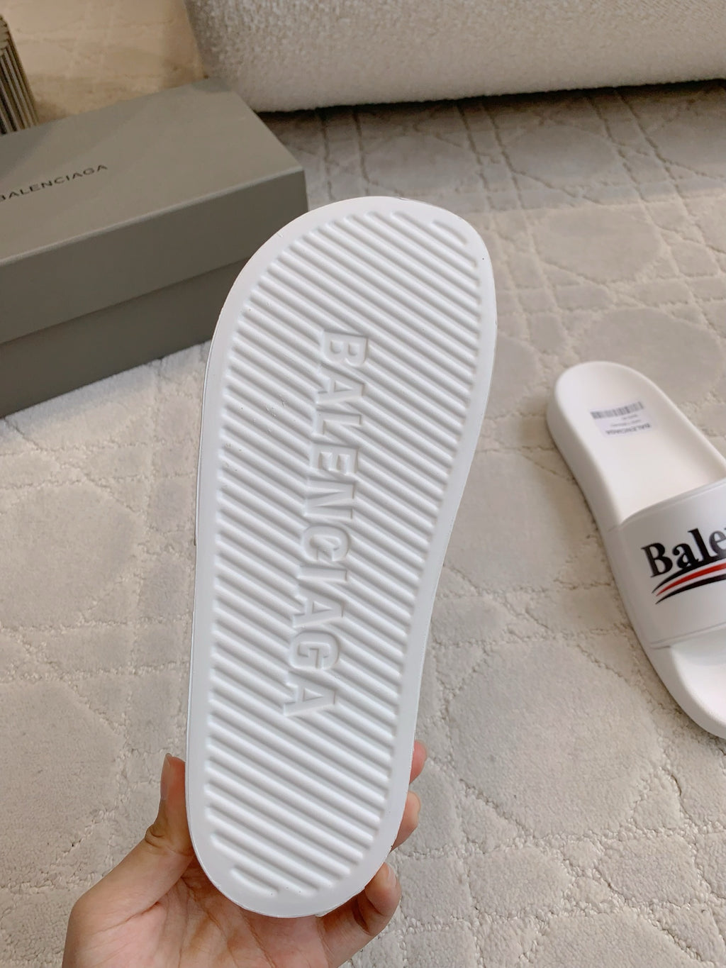 White slide sandal outsole with Balenciaga logo tread