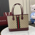 Gucci tote bag in GG canvas with burgundy trim, double handles, and green-red stripe