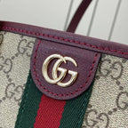 Gucci logo hardware on burgundy leather trim over GG canvas with green-red stripe