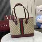 Gucci tote bag with GG canvas, burgundy top handles, and center green-red web stripe