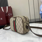 Gucci crossbody bag in beige GG canvas with green and red web stripe, top zip