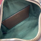 Gucci crossbody bag interior with teal lining and brown card holder pocket