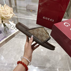 Gucci slide sandals, brown sole with GG canvas strap, green/red web stripe, gold-tone buckle
