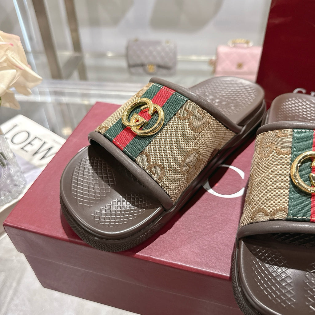 Gucci sandals close-up on top strap: GG canvas, multicolor stripe, gold double-G buckle