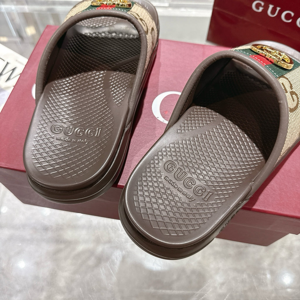Gucci sandals footbed close-up with textured tread and embossed Gucci branding