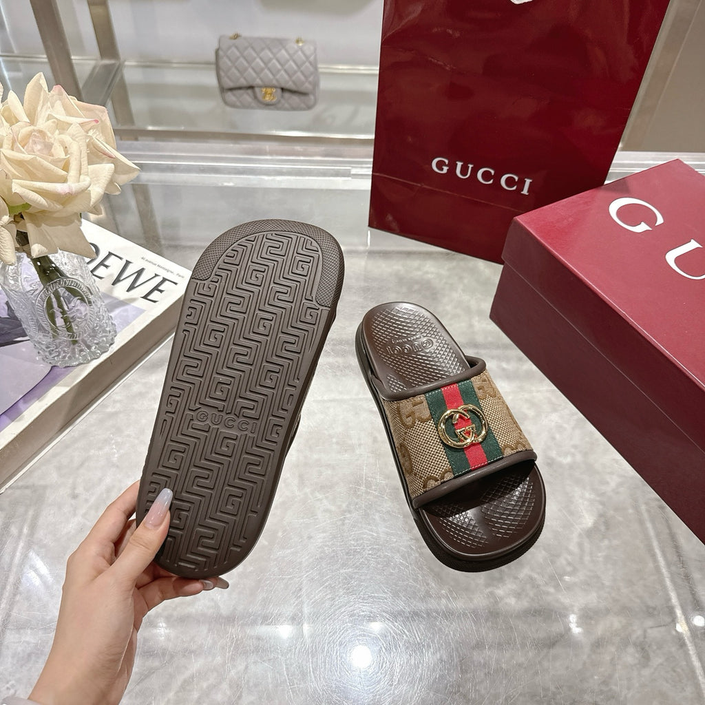 Gucci sandals soles with textured pattern and GG canvas strap with gold buckle