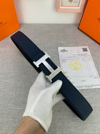 Hermes belt with navy leather strap and silver H buckle, with certificate card