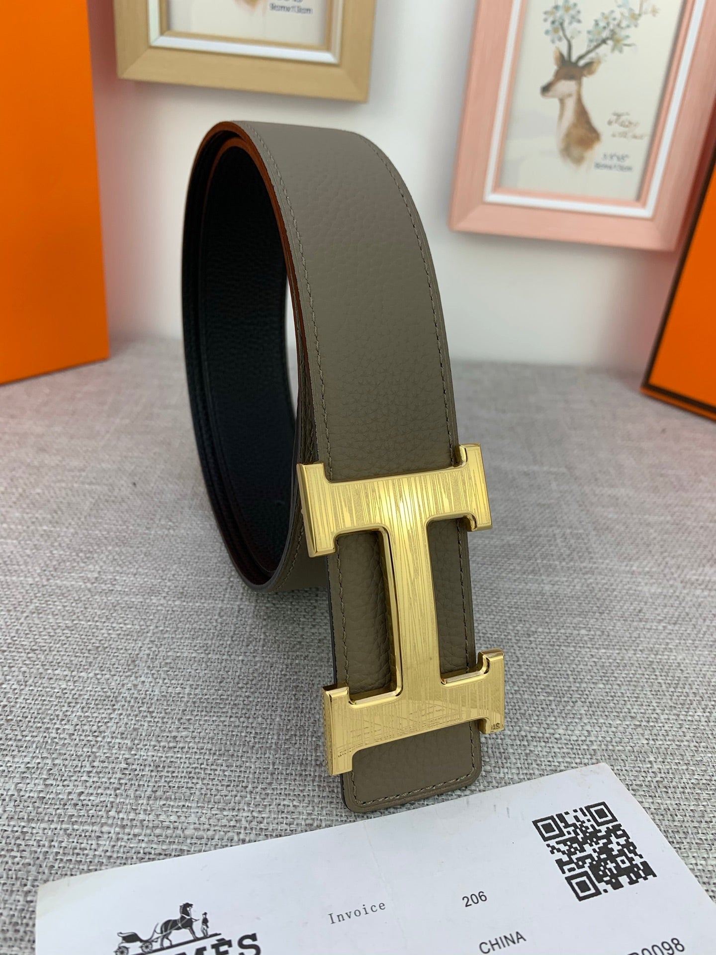 Reversible leather belt with dark sidewall and gold-tone H buckle