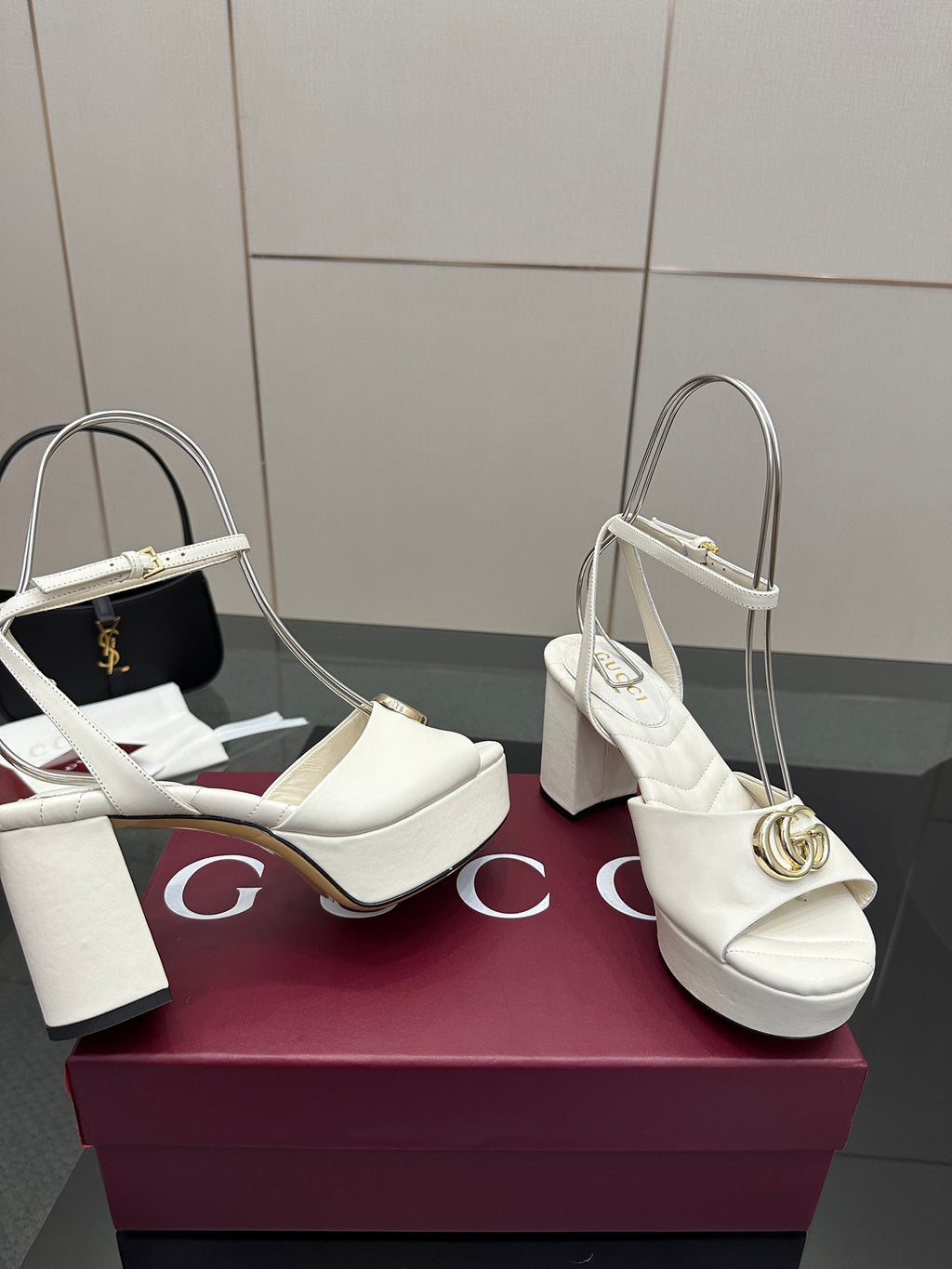 Gucci women's white platform heeled sandals with quilted straps and gold logo buckle