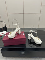 Gucci women's white platform sandals with gold logo buckle and block heel