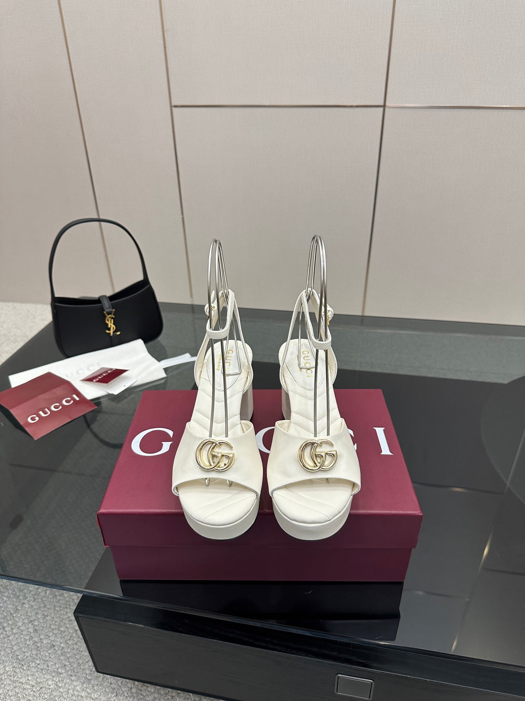 Gucci women's white platform heeled sandals with gold logo buckle and ankle strap