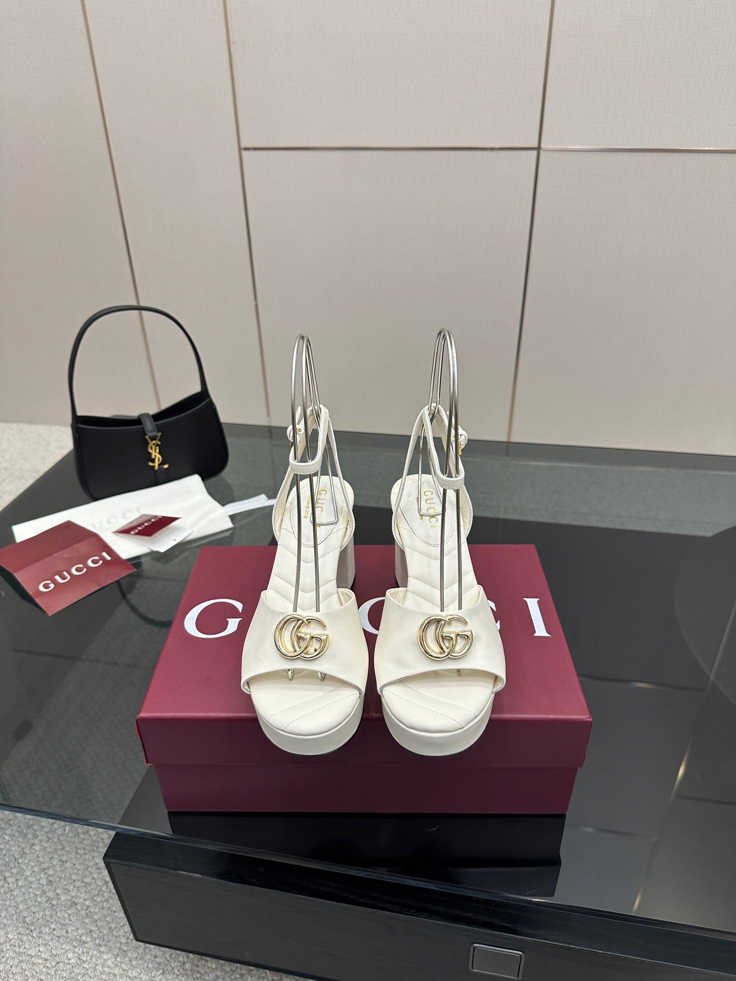Gucci women's white platform heeled sandals with gold logo buckle and ankle strap