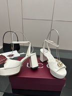 Gucci women's white heeled sandals with gold buckle, block heel, and slingback strap