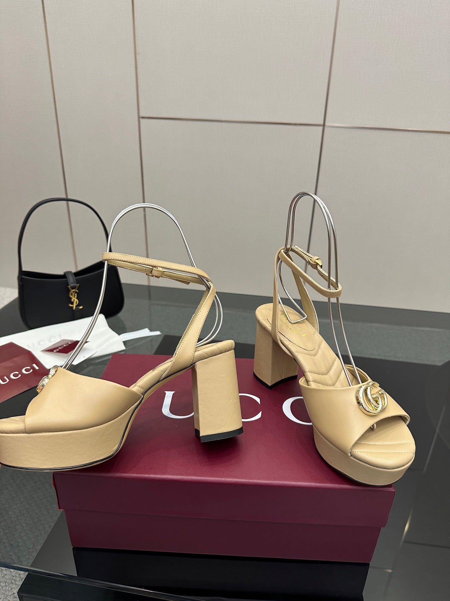 Women's cream open-toe heeled sandals with slingback straps and gold-tone Gucci logo