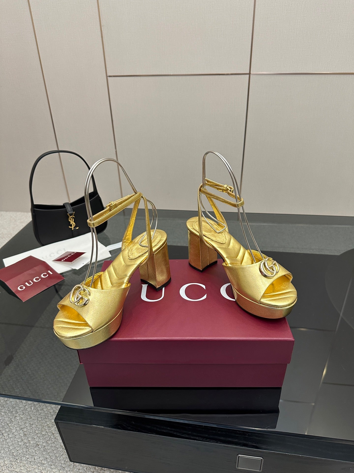Gucci metallic gold peep-toe heeled sandals with ankle straps and thick platform