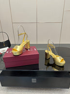 Gucci metallic gold platform heeled sandals with peep toe and ankle sling straps