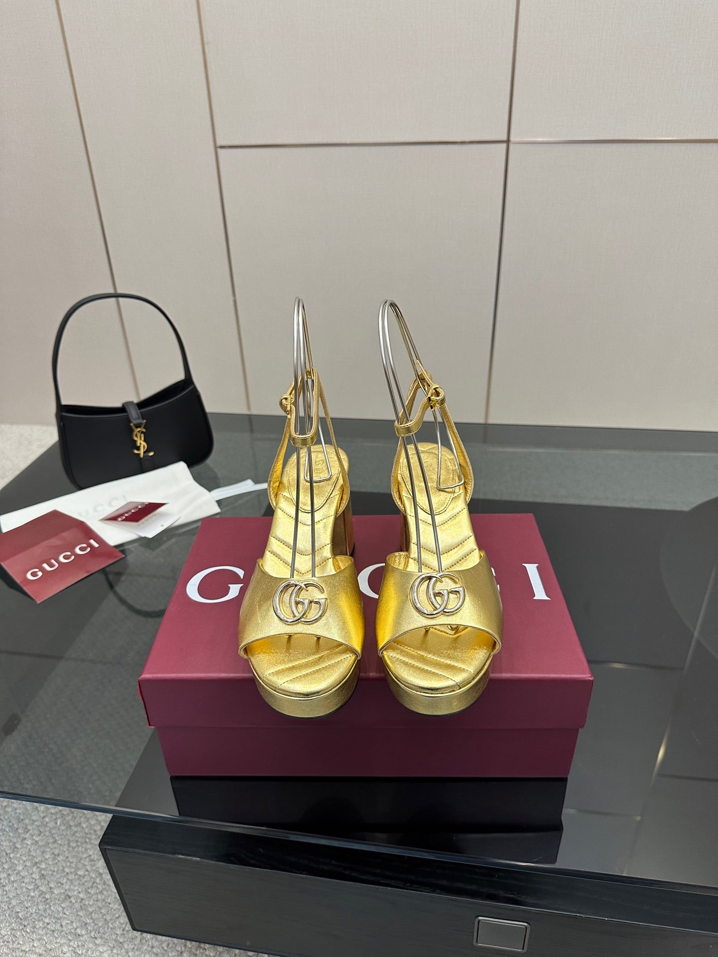 Gucci metallic gold heeled sandals with peep toe and slim ankle straps