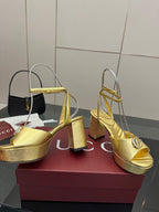 Gucci metallic gold platform sandals with peep toe and chunky block heel