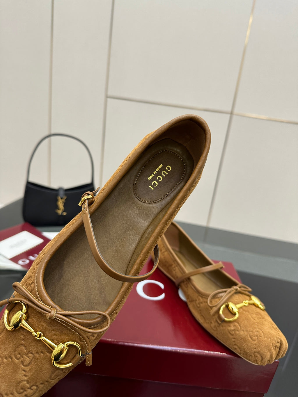 Gucci ladies loafers in tan with gold-tone horsebit hardware, heel and insole view