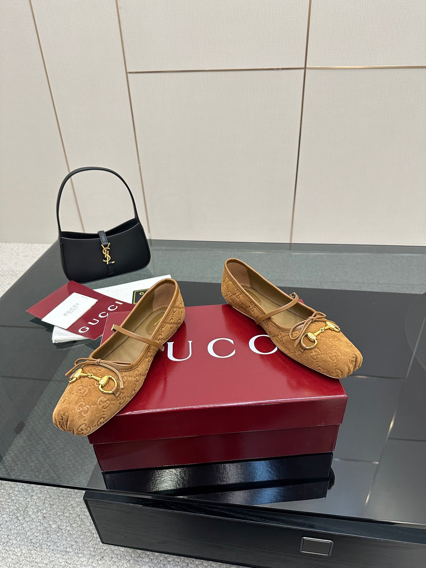 Gucci ladies loafers in tan patterned fabric with gold-tone horsebit hardware, pair view