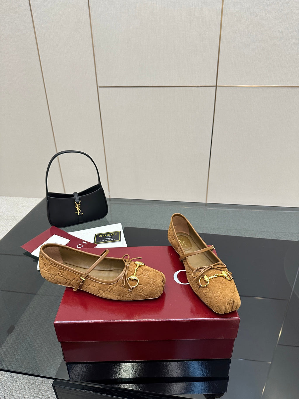 Gucci ladies loafers in tan with strap and gold-tone horsebit hardware, side view
