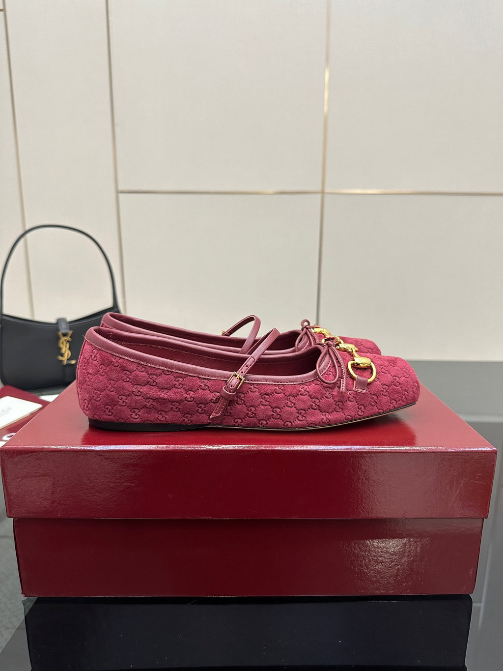 Gucci ladies pink textured loafers, top view with gold-tone buckle detail.