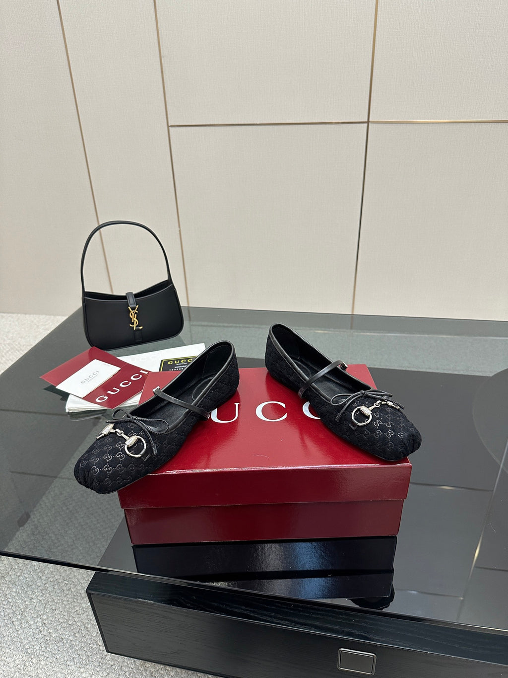 Gucci black slip-on loafers with Horsebit-style metal detail on patterned fabric