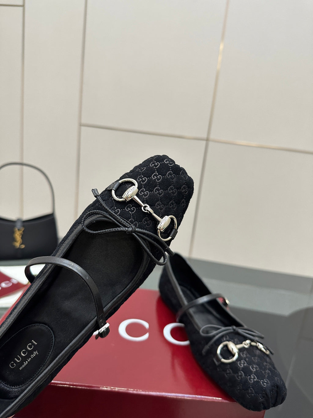 Gucci black slip-on flats with Horsebit-style metal hardware and patterned fabric