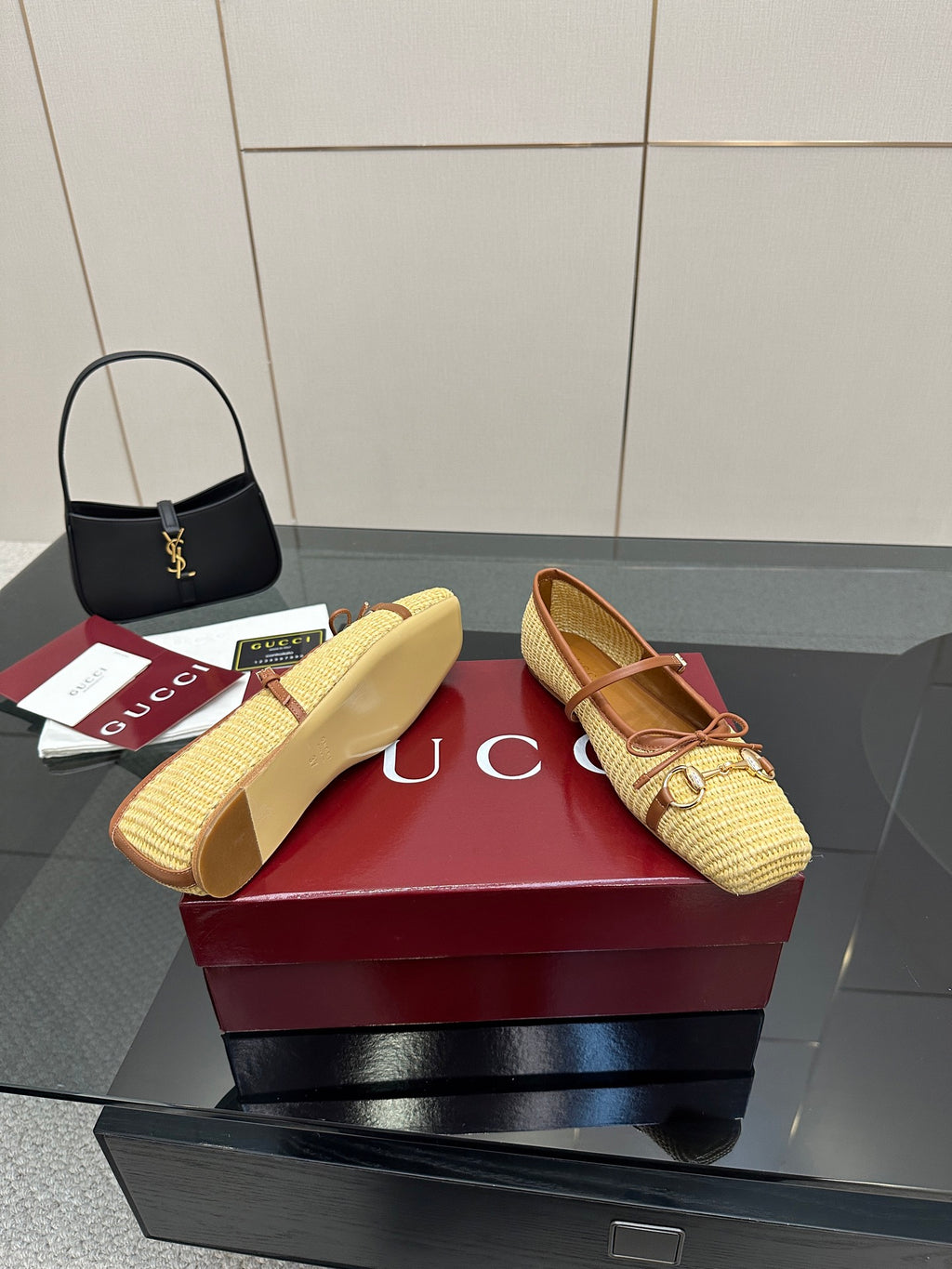 Gucci ladies woven loafers in yellow with brown trim, one shoe up and one placed