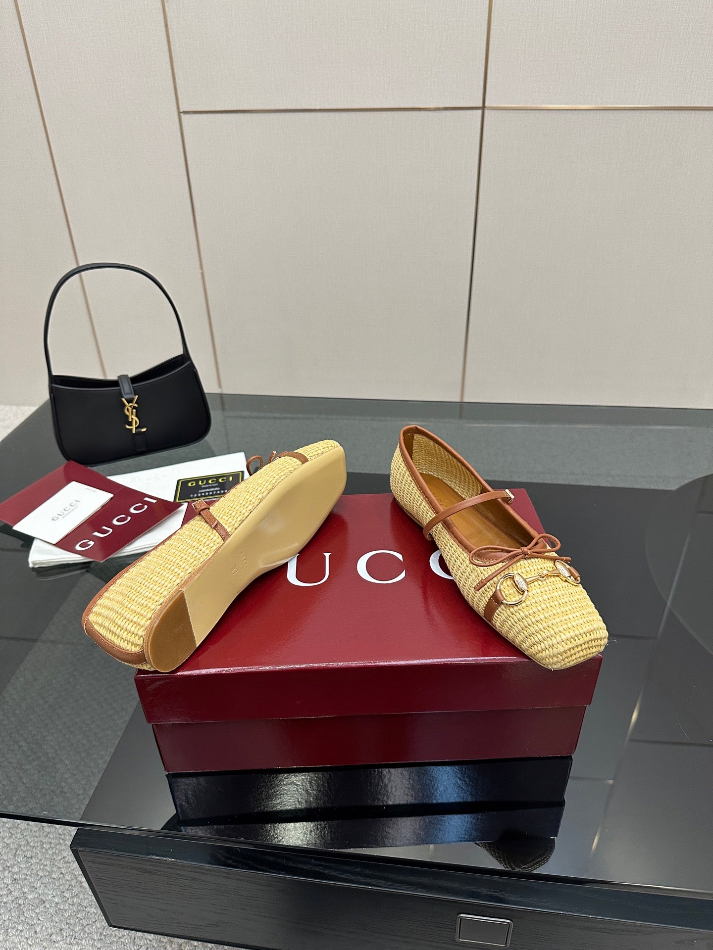 Gucci ladies woven loafers in yellow with brown trim, one shoe up and one placed