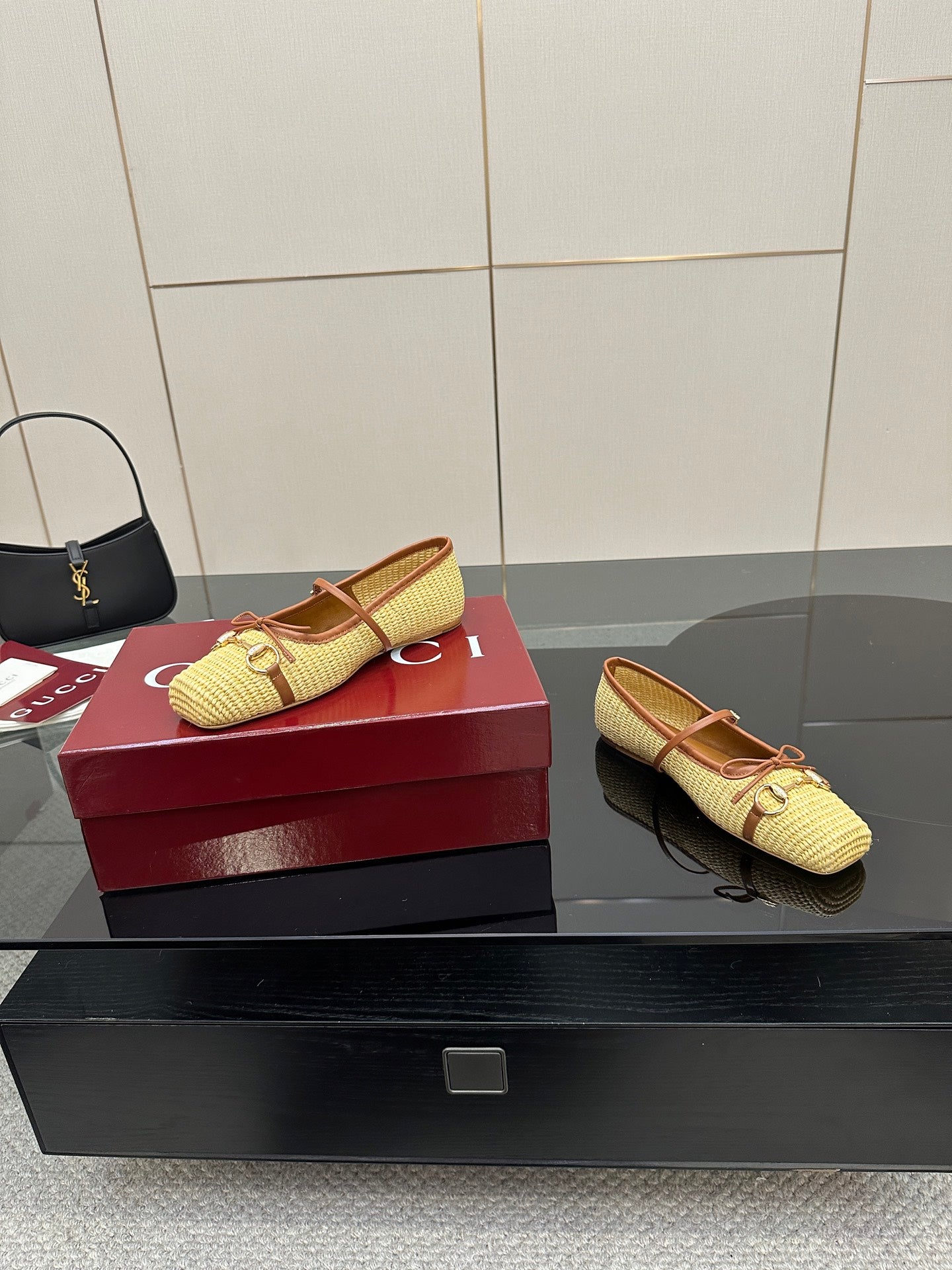 Gucci ladies woven loafers in yellow with brown trim, side view with heel visible