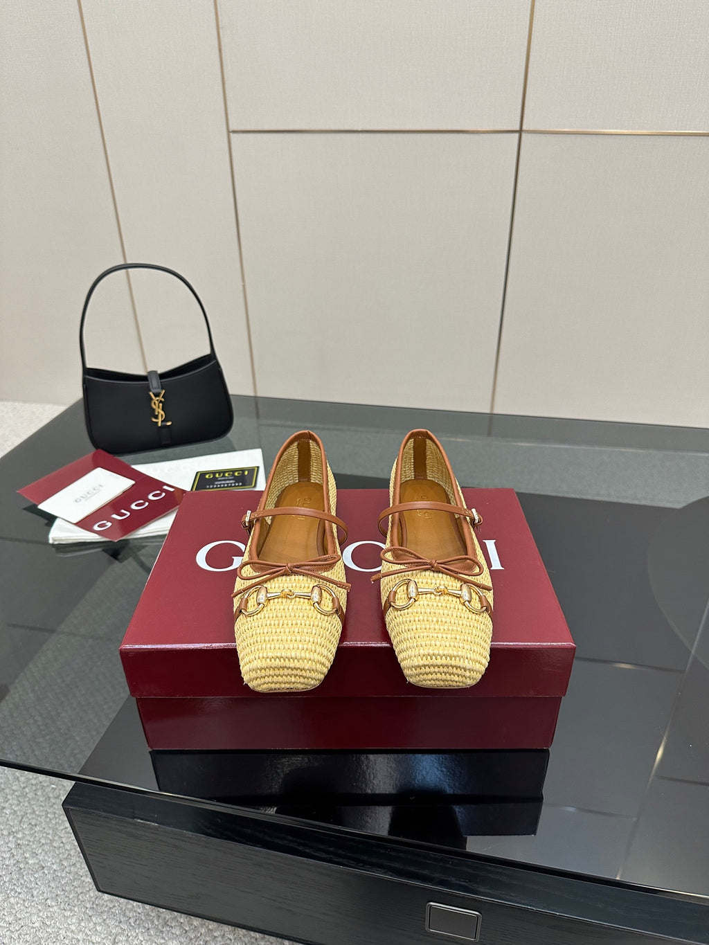 Gucci ladies woven loafers in yellow with brown trim, front view pair on box