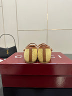 Gucci ladies woven loafers in yellow with brown trim, rear view pair